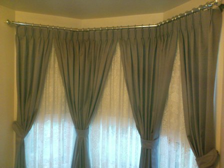Pinch pleated curtains for bay window